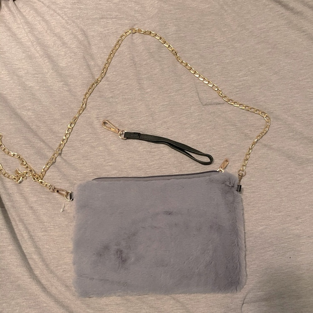 Gray furry wristlet with chain